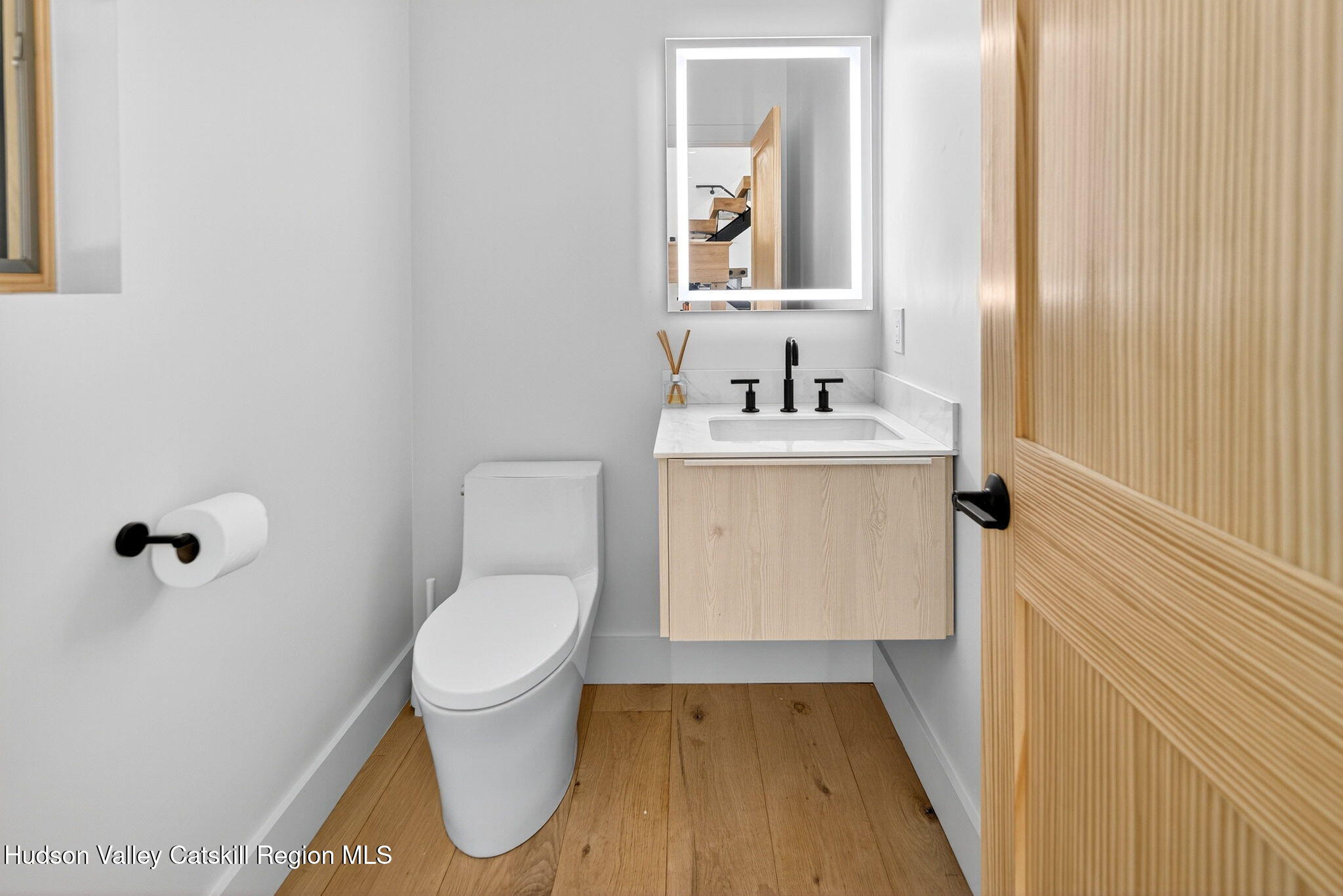 110 Old Road Windham, NY 12496 - Photo 22 of 66 a bathroom with a toilet and a sink