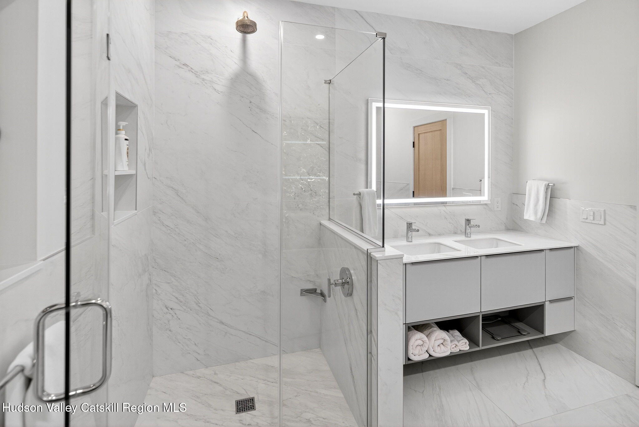 110 Old Road Windham, NY 12496 - Photo 24 of 66 a bathroom with a sink vanity and a mirror