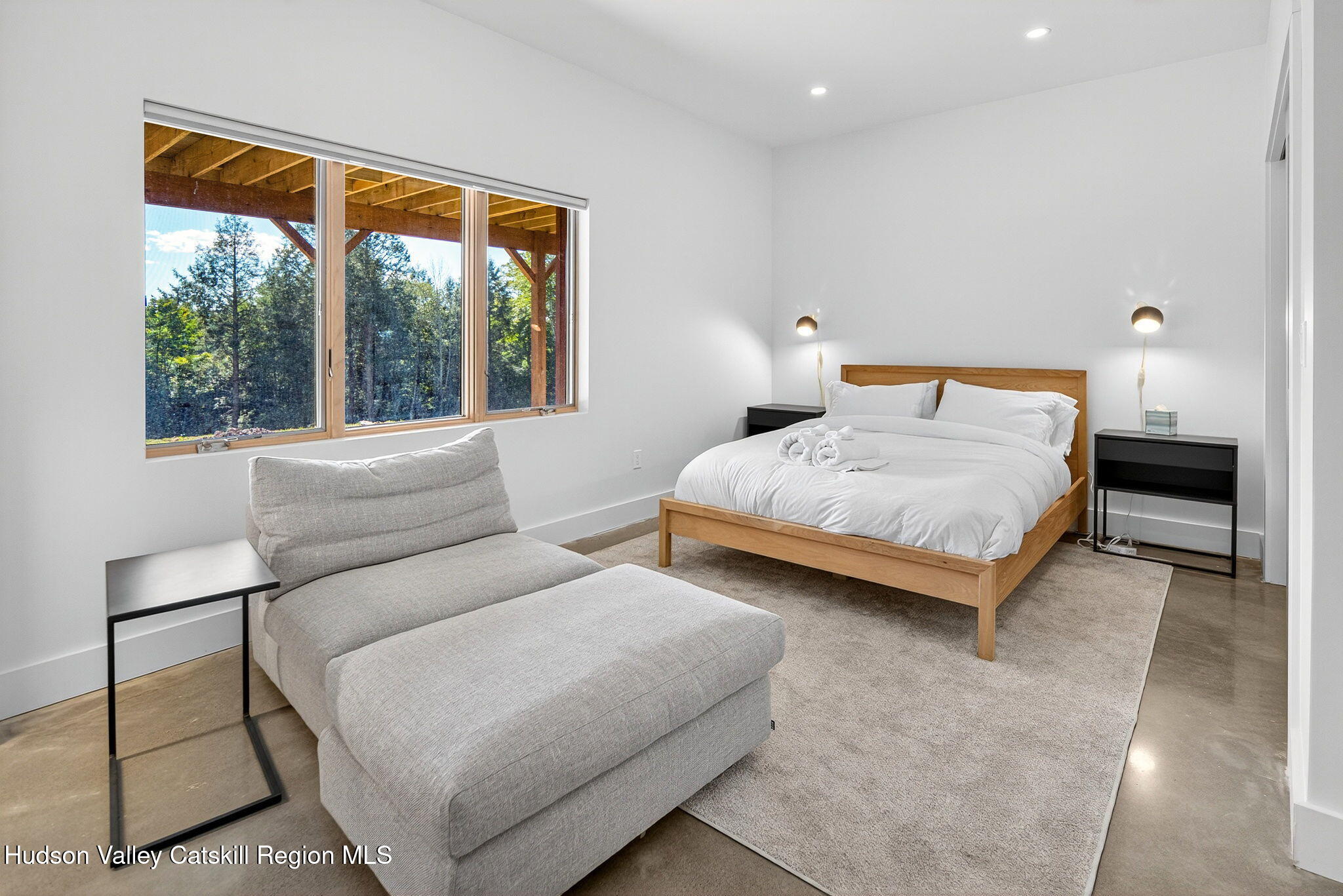 110 Old Road Windham, NY 12496 - Photo 27 of 66 a bedroom with a bed and a large window