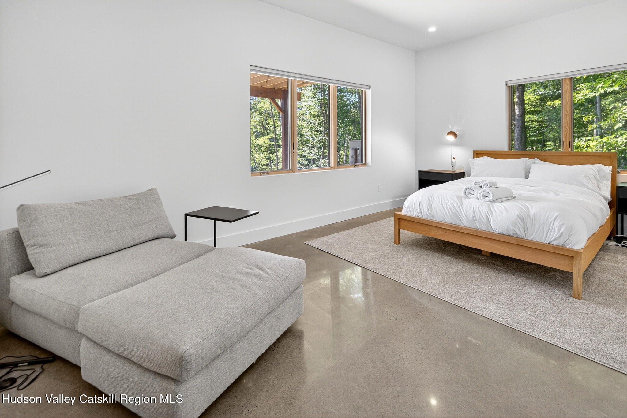 110 Old Road Windham, NY 12496 - Photo 28 of 66 a bedroom with a bed lamp and window