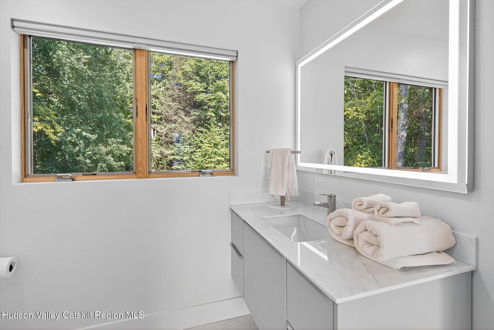 110 Old Road Windham, NY 12496 - Photo 35 of 66 a bathroom with a sink and a window