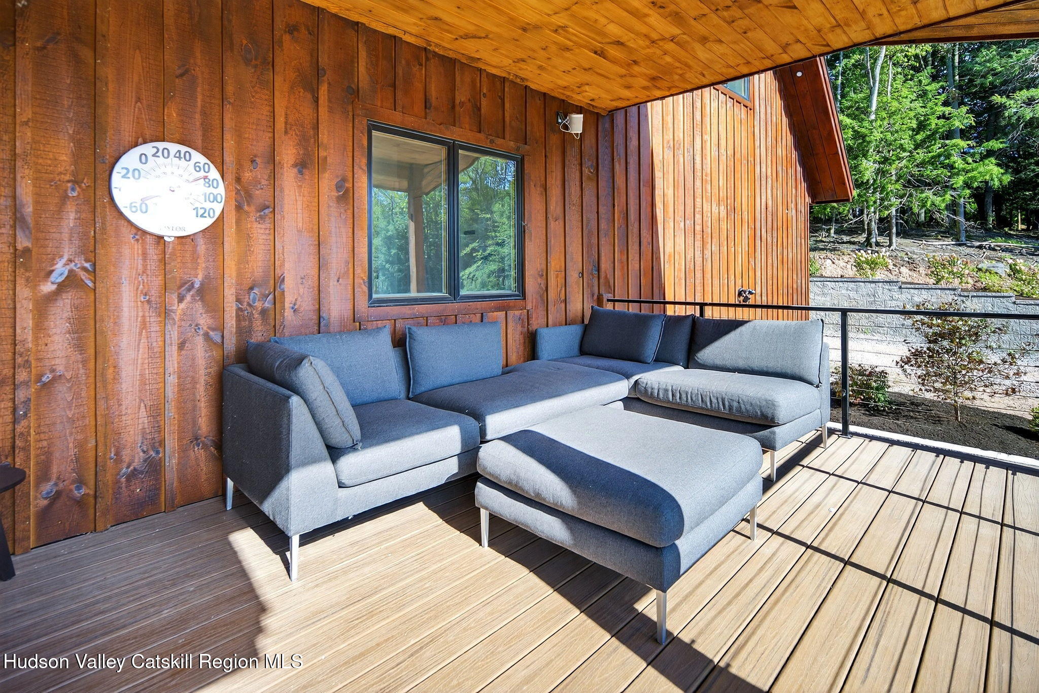 110 Old Road Windham, NY 12496 - Photo 45 of 66 a living room with furniture and a large window