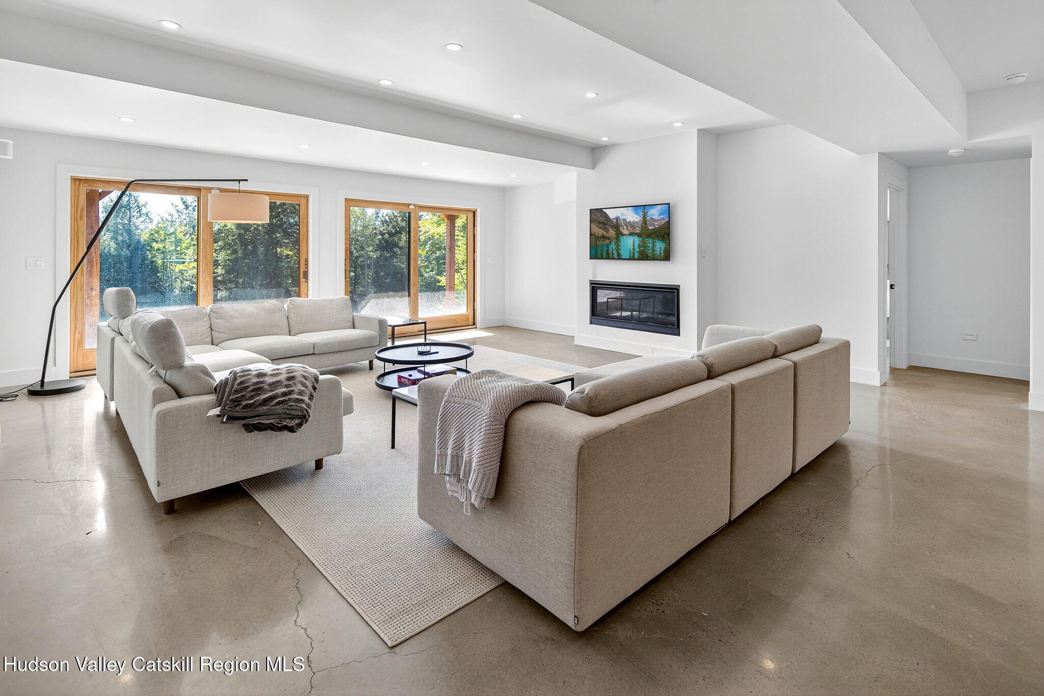 110 Old Road Windham, NY 12496 - Photo 8 of 66 a living room with furniture and large window