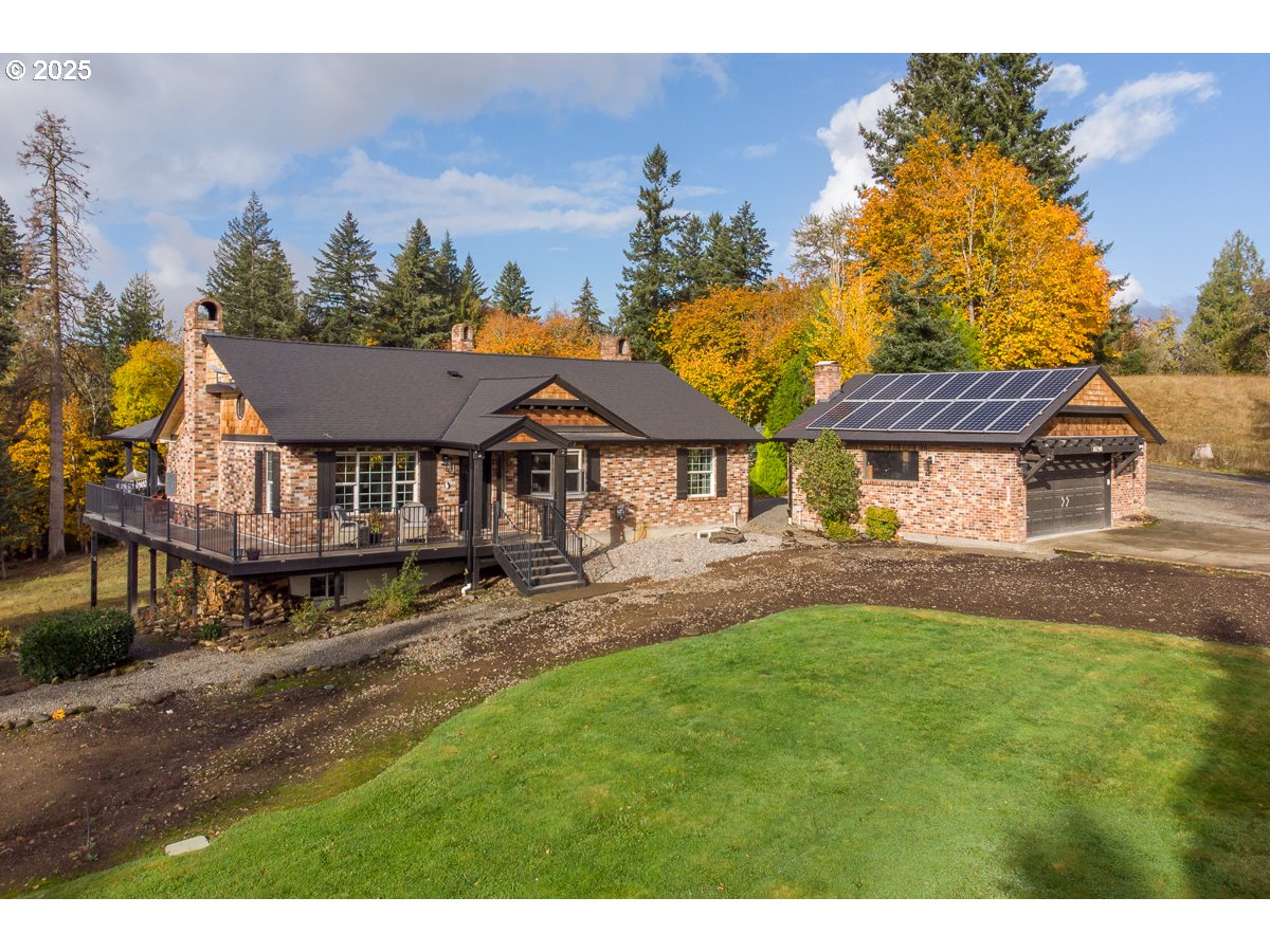 16290 South Riverview Road Molalla, OR 97038 - Photo 1 of 43 a view of an house with backyard and sitting area