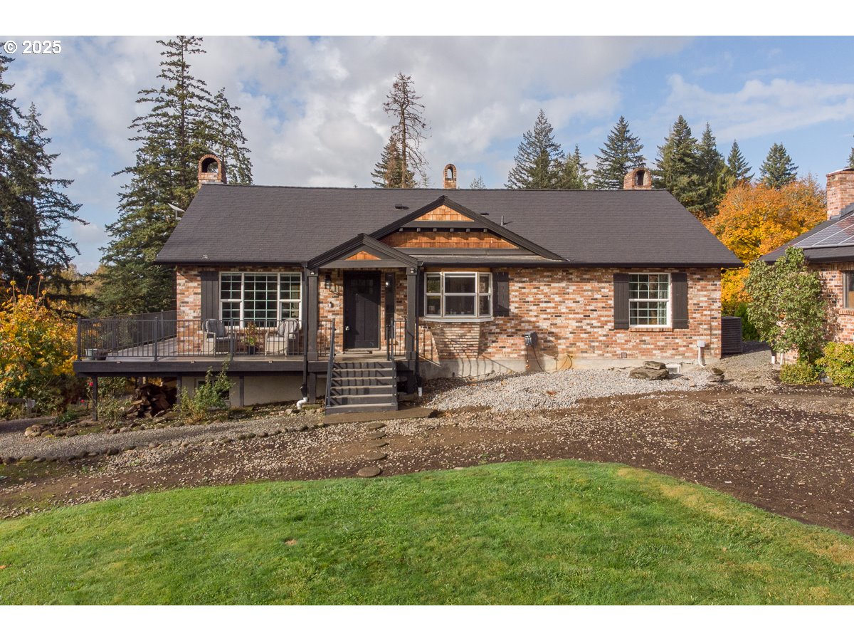 16290 South Riverview Road Molalla, OR 97038 - Photo 2 of 43 a house with green field in front of it