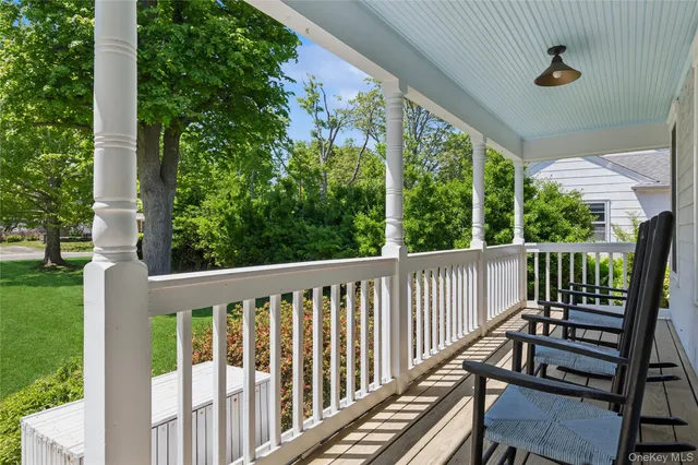 a view of a two chairs in the deck