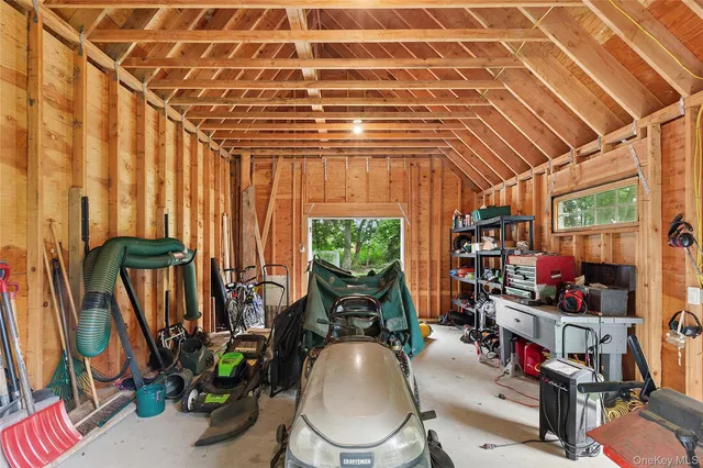 a picture of a bench in front of a wall