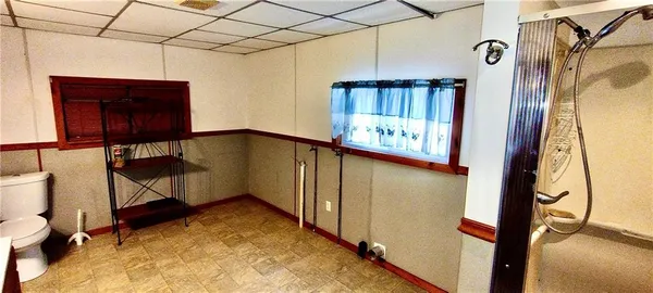 a view of a hallway with staircase