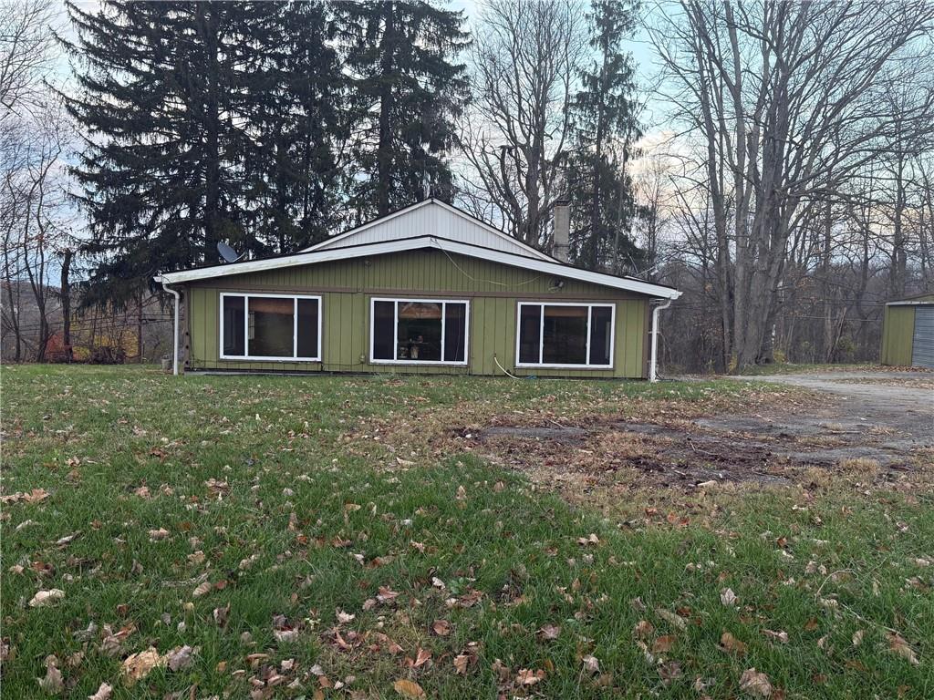 721 South 88th Road Carmichaels, PA 15320 - Photo 3 of 27 a house that has a tree in front of the house