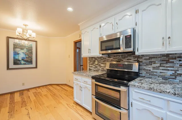 a bedroom with bed and a window