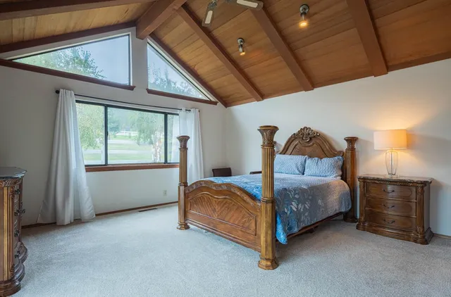 a view of an ocean and a mountain