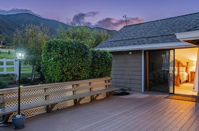 a view of a golf course with a lake