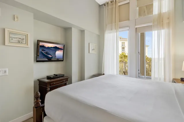 a bathroom with a sink mirror and toilet