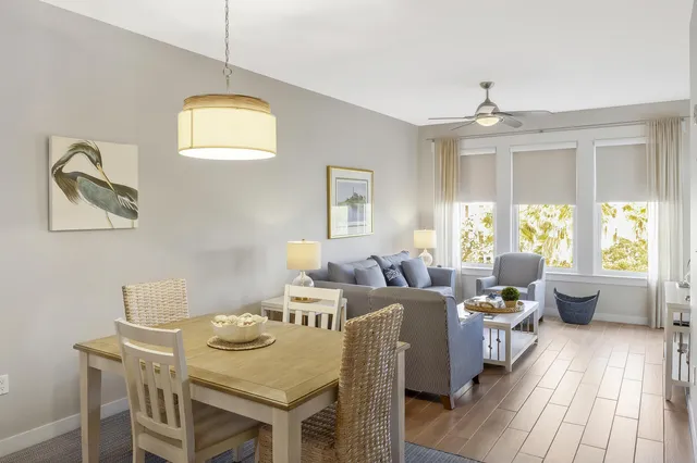 a view of a dining room with furniture window and outside view