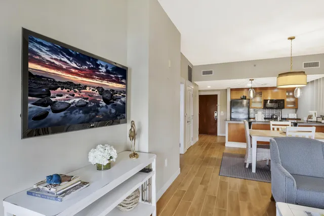 a living room with furniture lamp and window