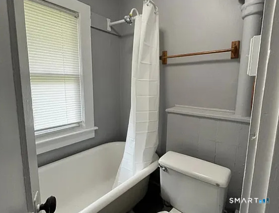 22 Green Street Middletown, CT 06457 - Photo 5 of 5 a white toilet sitting next to a bath tub