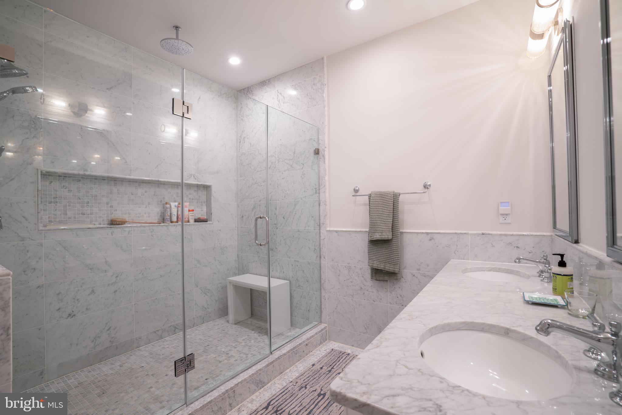 911 M Street Northwest Washington, DC 20001 - Photo 15 of 31 a bathroom with a sink a toilet and shower