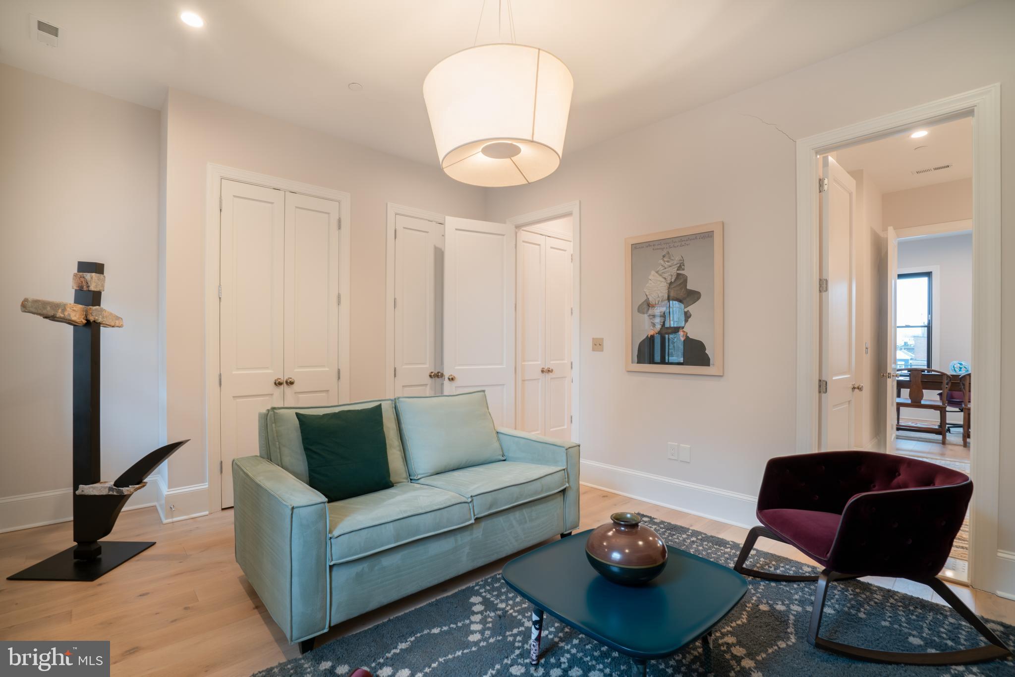 911 M Street Northwest Washington, DC 20001 - Photo 17 of 31 a living room with furniture and a rug