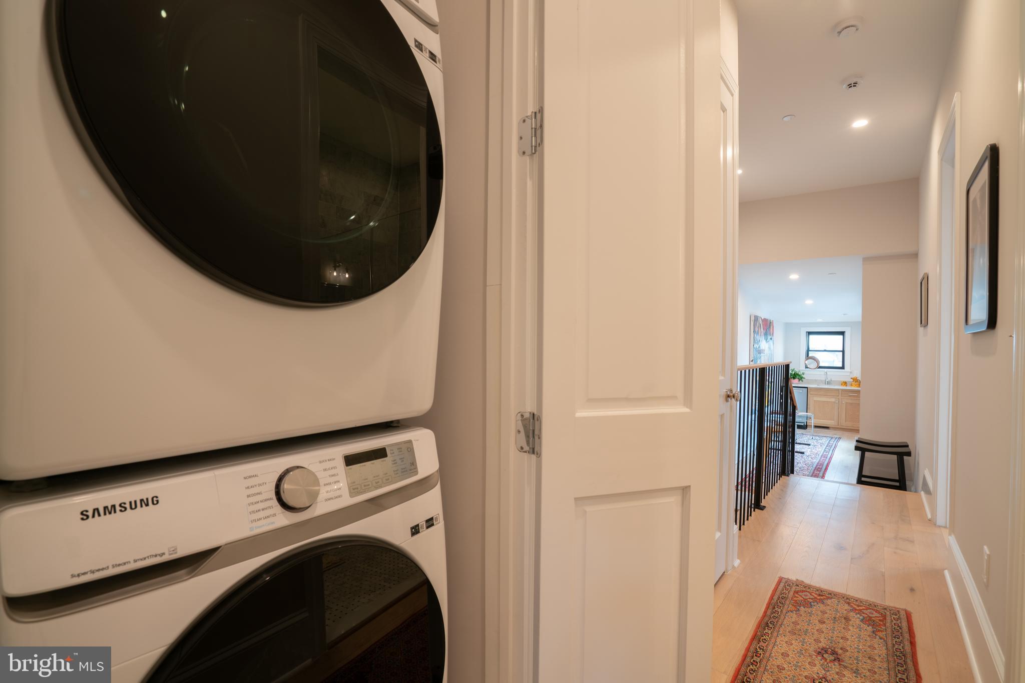 911 M Street Northwest Washington, DC 20001 - Photo 20 of 31 a view of a hallway with washer and dryer