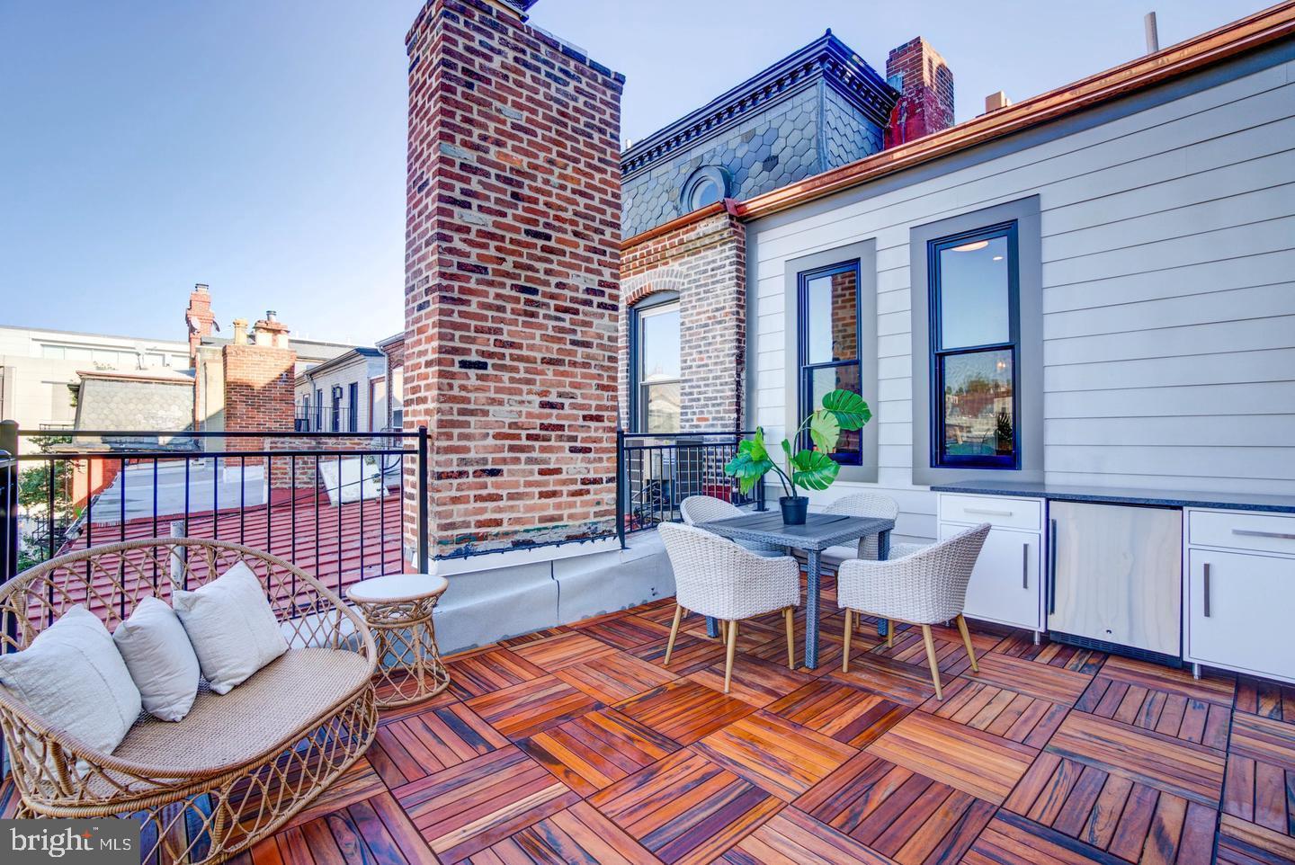 911 M Street Northwest Washington, DC 20001 - Photo 21 of 31 a chairs and a table in a balcony