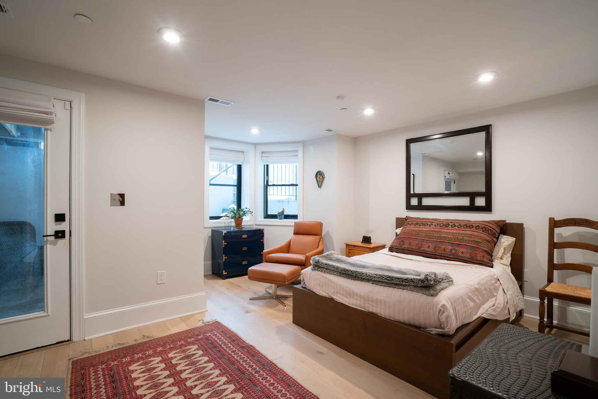 911 M Street Northwest Washington, DC 20001 - Photo 25 of 31 a bedroom with a bed and wooden floor