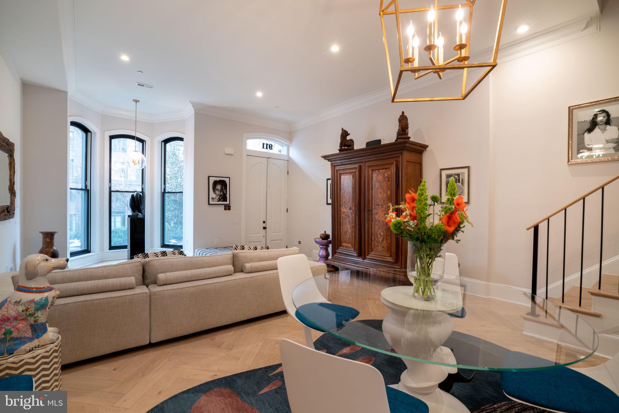 911 M Street Northwest Washington, DC 20001 - Photo 3 of 31 a living room with furniture potted plant and a mirror