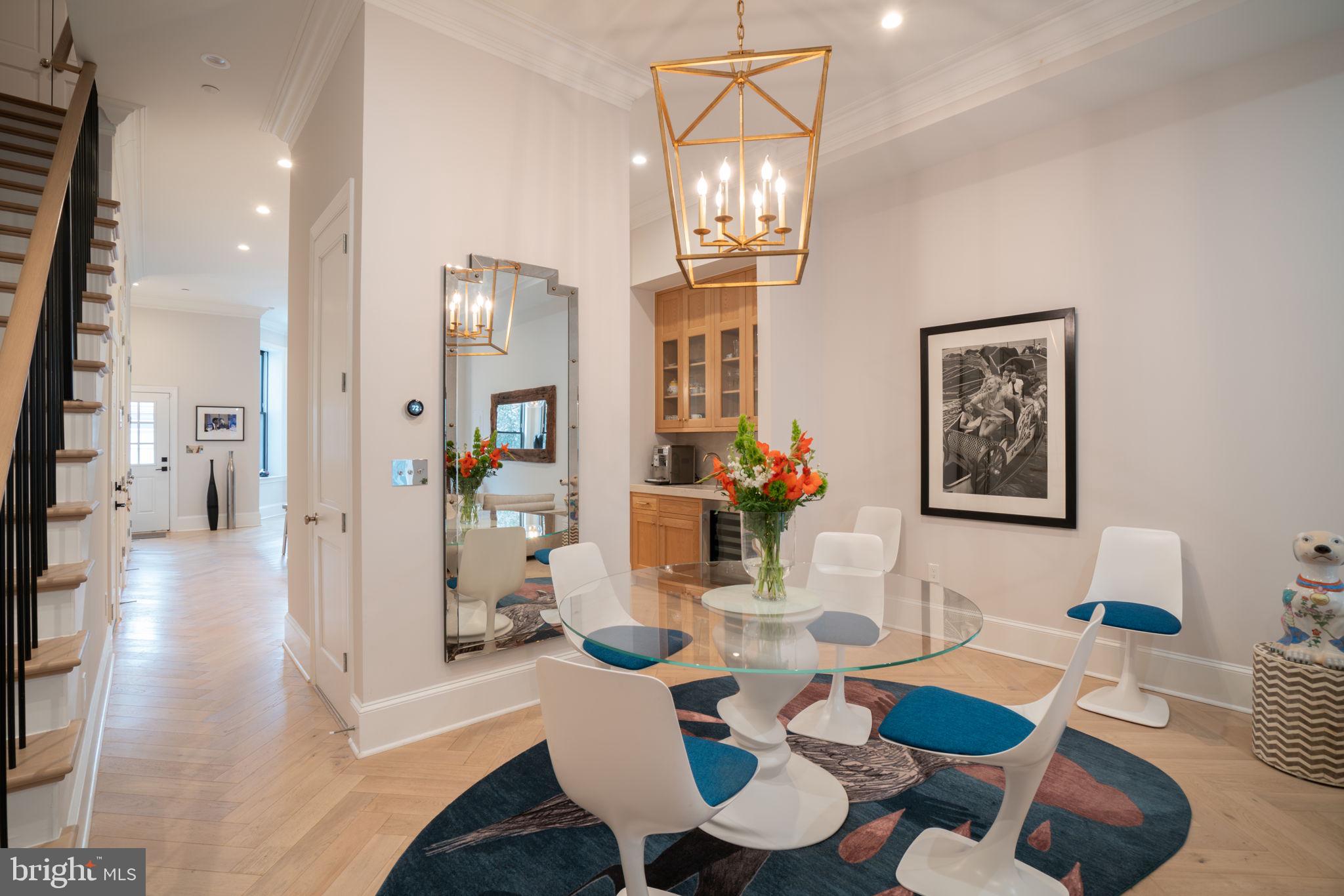 911 M Street Northwest Washington, DC 20001 - Photo 4 of 31 a view of a dining room with furniture and wooden floor