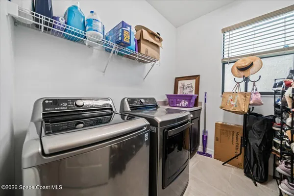 a kitchen with stainless steel appliances and cabinets