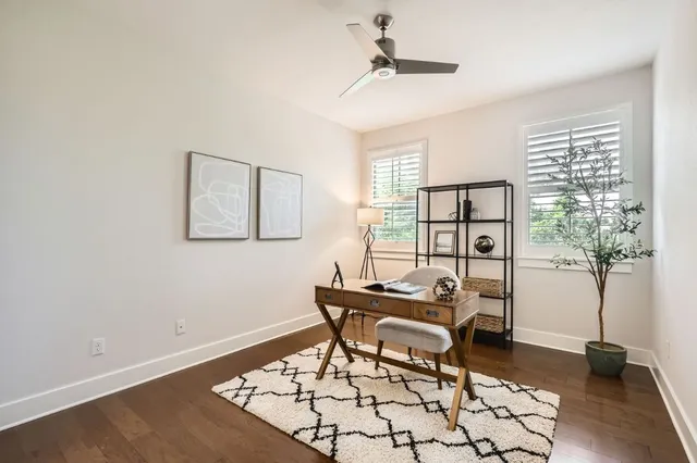 a room with furniture and a window