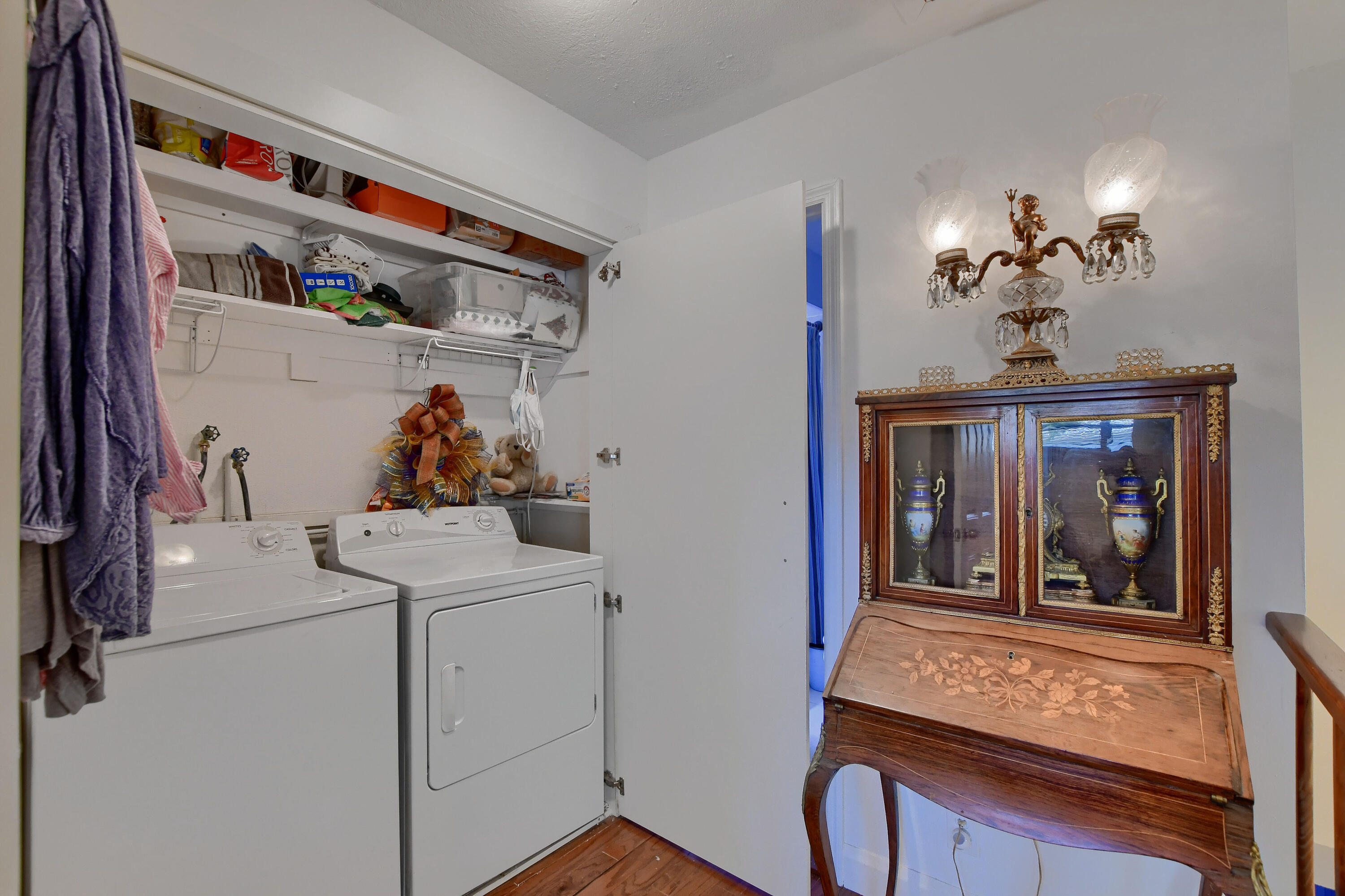 149 Northwest 70th Street, Unit 306C Boca Raton, FL 33487 - Photo 23 of 27 Laundry Area