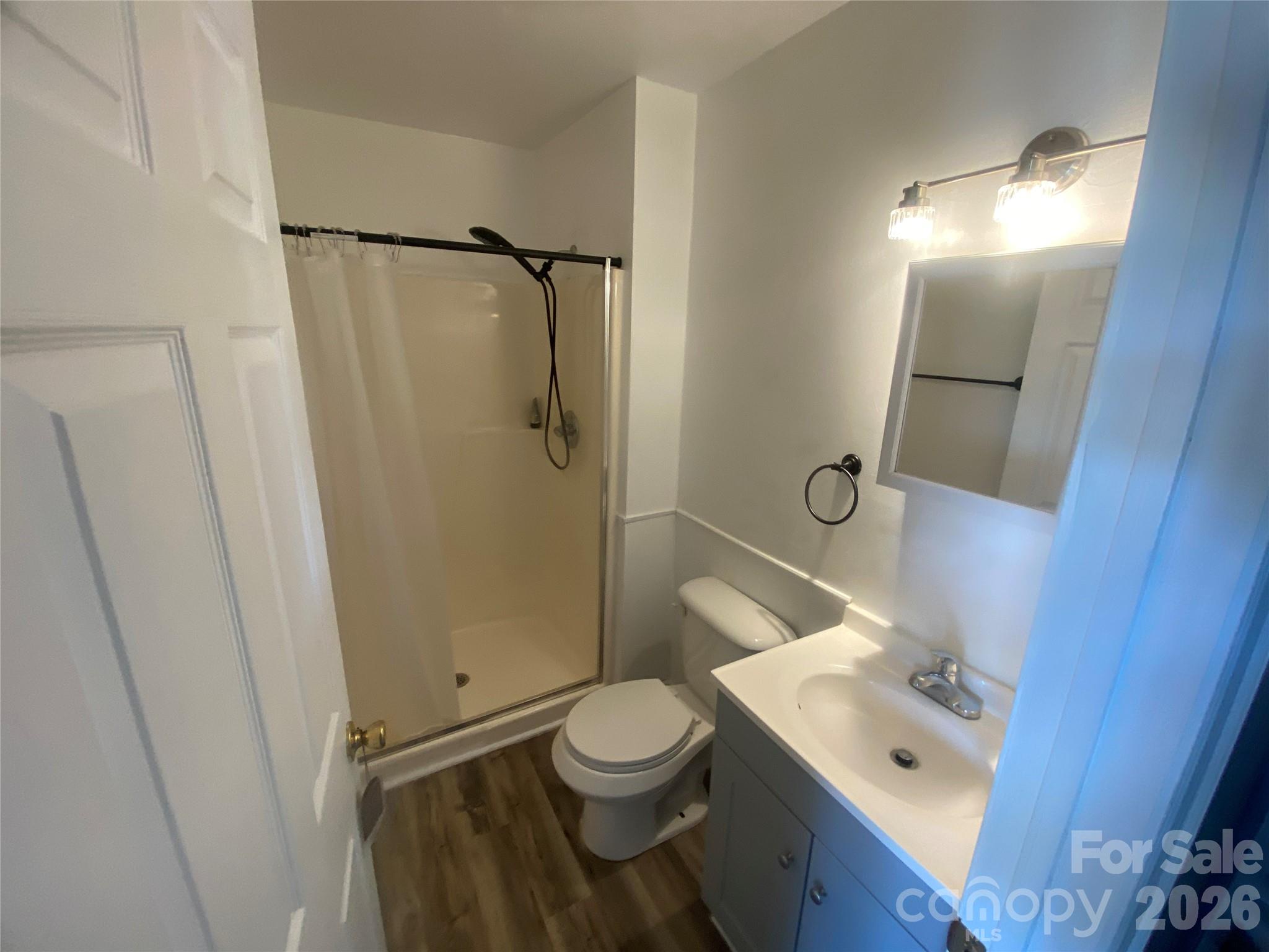 788 Coley Road Salisbury, NC 28146 - Photo 31 of 43 a bathroom with a toilet a sink and a shower