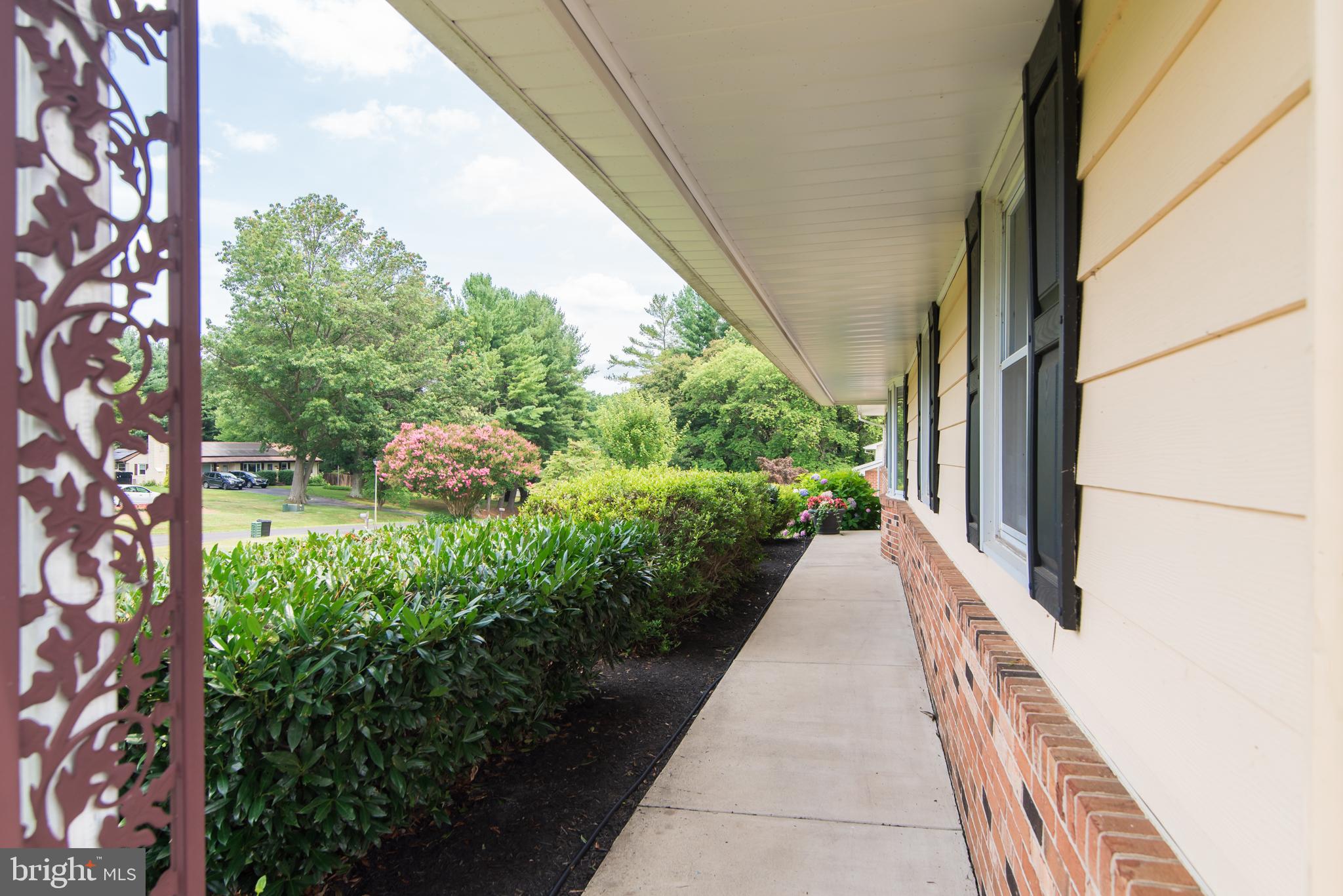 8235 Hilton Road Gaithersburg, MD 20882 - Photo 11 of 90 Sheltered walkway leading to front door