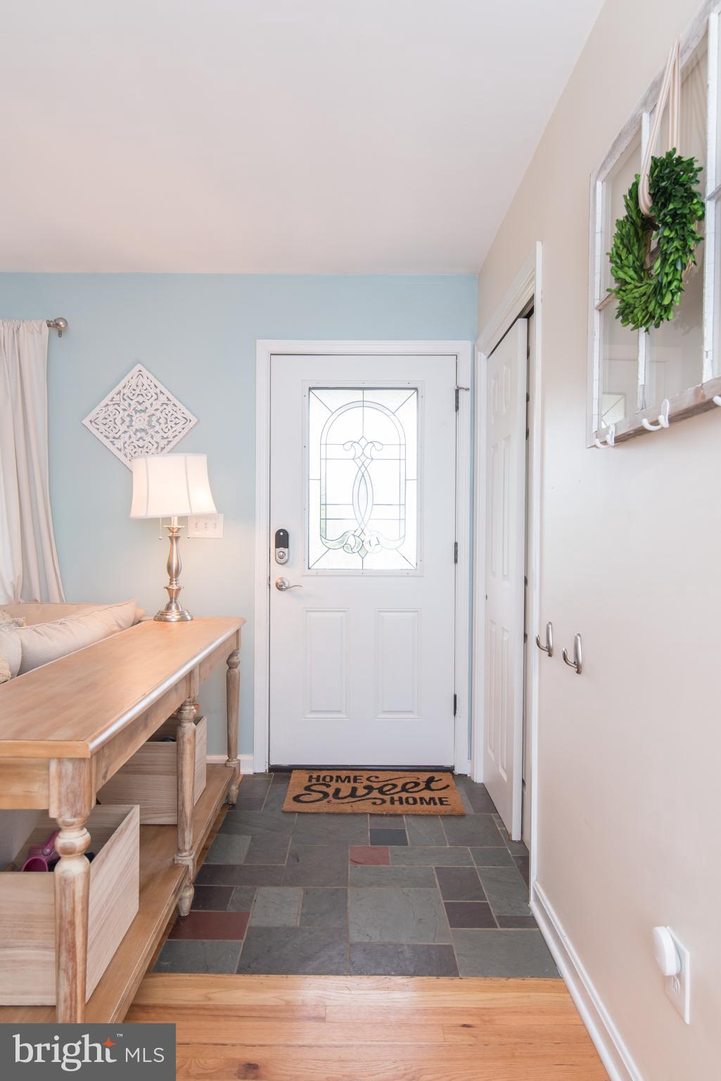 8235 Hilton Road Gaithersburg, MD 20882 - Photo 16 of 90 Foyer with slate flooring and coat closet