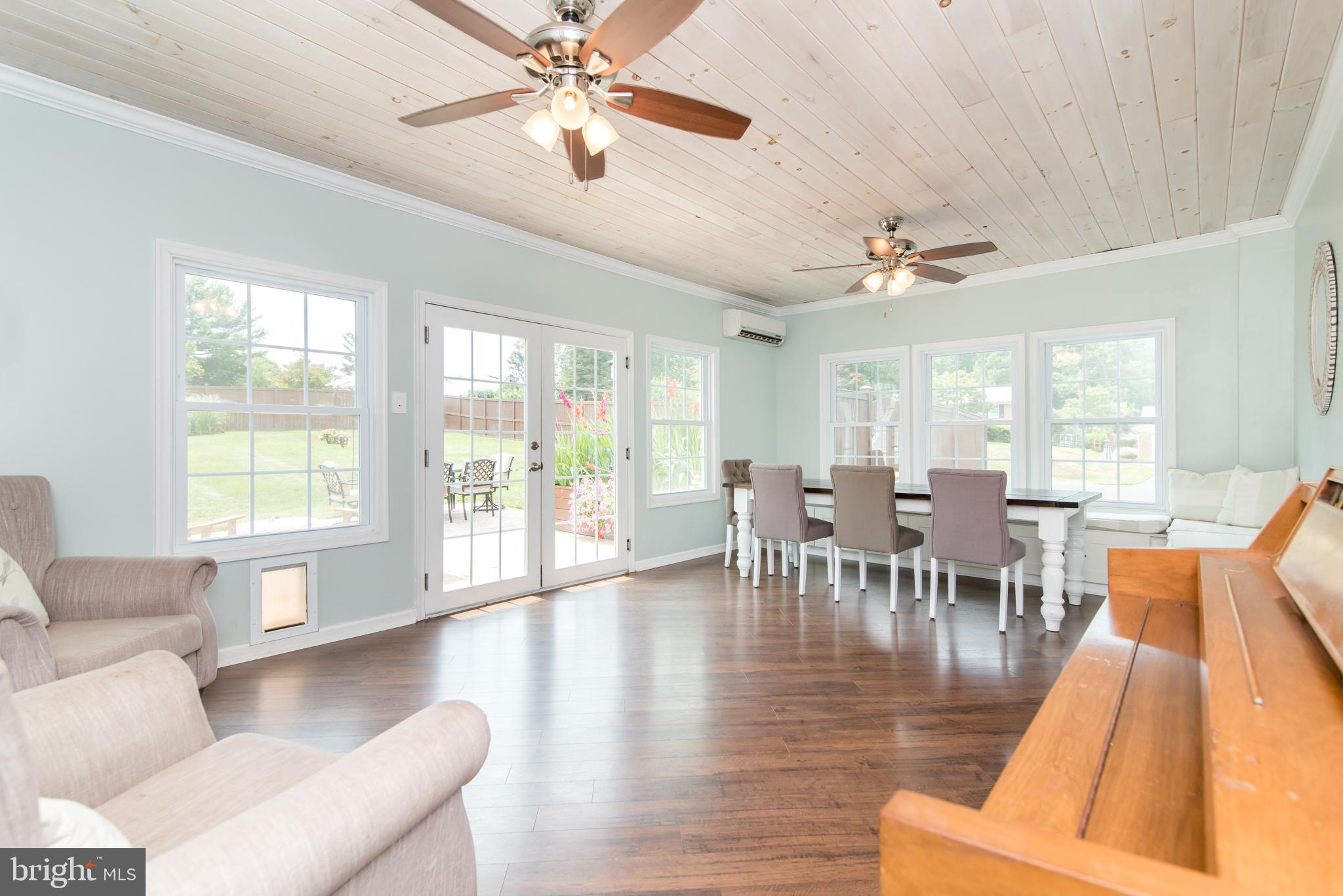 8235 Hilton Road Gaithersburg, MD 20882 - Photo 25 of 90 Massive sunroom with stunning wood ceilings!