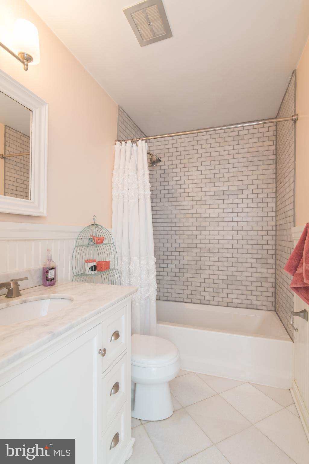 8235 Hilton Road Gaithersburg, MD 20882 - Photo 33 of 90 Full hall bathroom with tub/shower combo