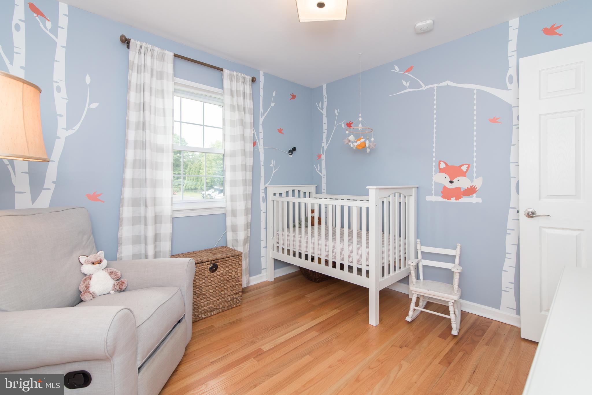 8235 Hilton Road Gaithersburg, MD 20882 - Photo 36 of 90 Bedroom 2 with two windows and ceiling fan
