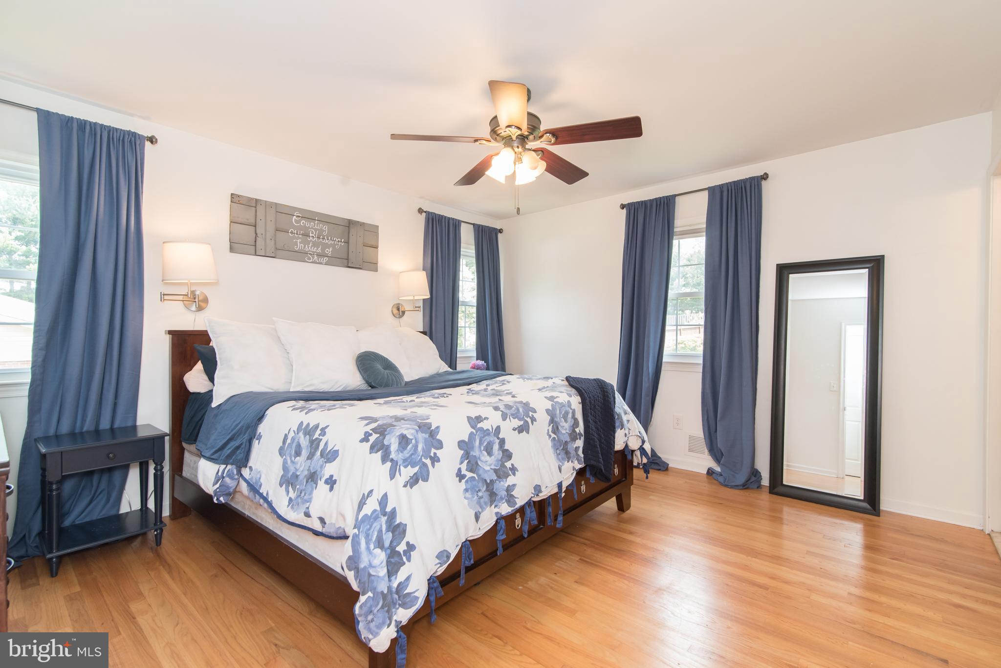 8235 Hilton Road Gaithersburg, MD 20882 - Photo 41 of 90 Sizeable primary bedroom with hardwood floors