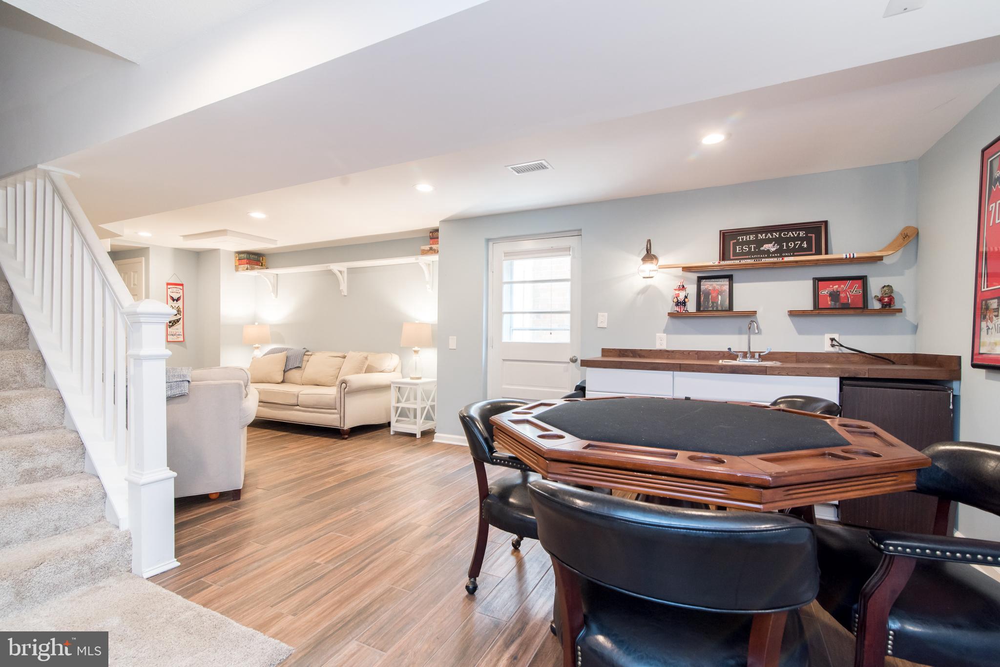 8235 Hilton Road Gaithersburg, MD 20882 - Photo 56 of 90 Gaming area with wet bar- lower level