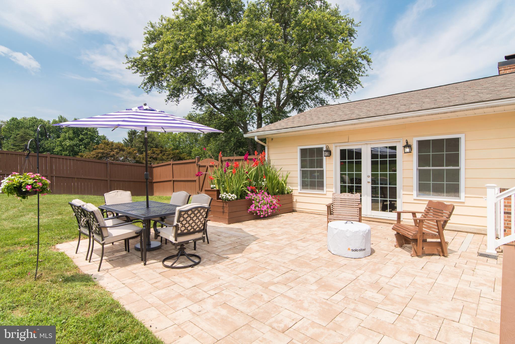 8235 Hilton Road Gaithersburg, MD 20882 - Photo 82 of 90 Double French doors lead out to the patio area