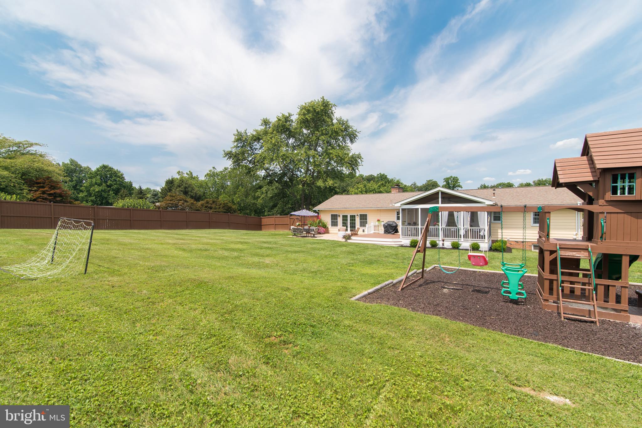 8235 Hilton Road Gaithersburg, MD 20882 - Photo 85 of 90 View of the play set and backyard
