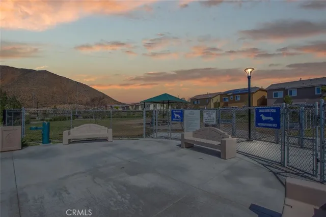 an aerial view of a swimming pool and outdoor space
