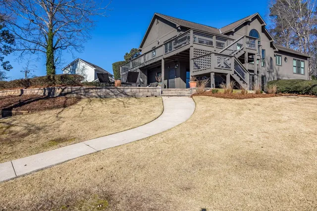 a kitchen with sink cabinets and wooden floor