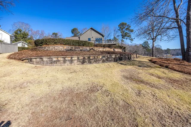 a living room with fireplace furniture and a flat screen tv