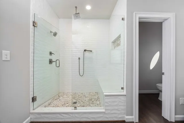 a view of a swimming pool with a yard