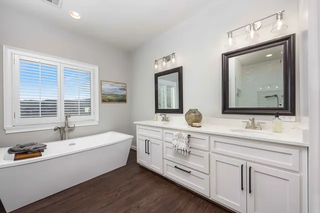 a view of a backyard with sitting area