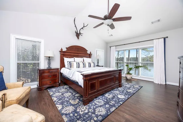 a view of a swimming pool with chairs