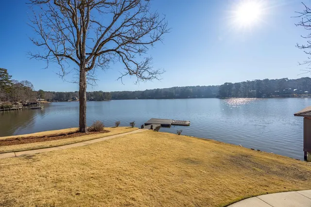 a view of swimming pool with outdoor seating