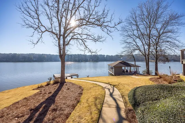 a view of a house with snow on the road