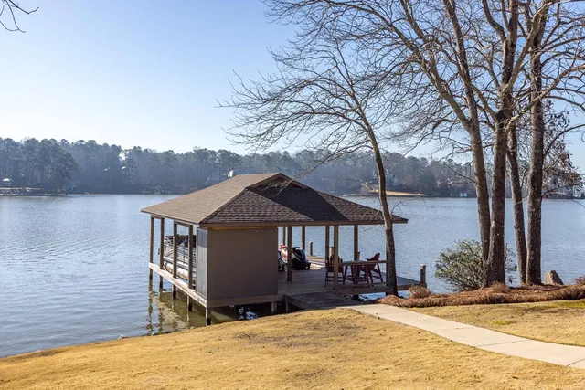 a view of outdoor space with wooden floor