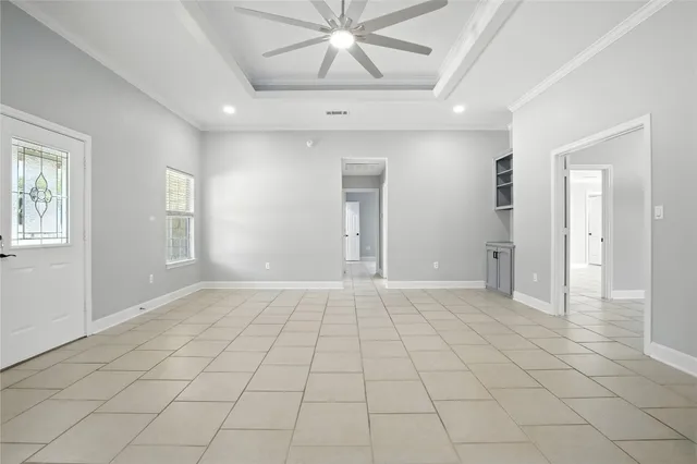 a view of an empty room and window